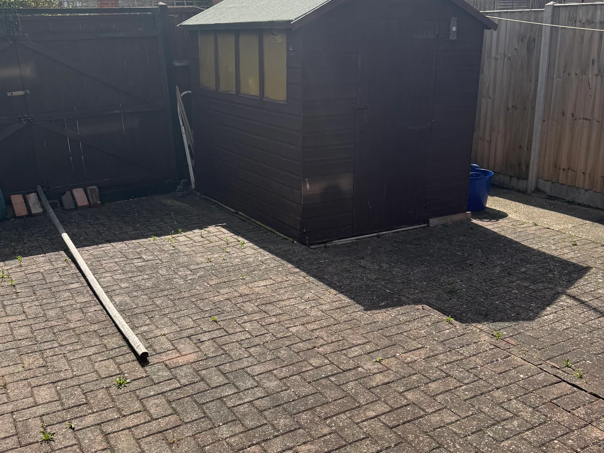 Block pave driveway before pressure washing