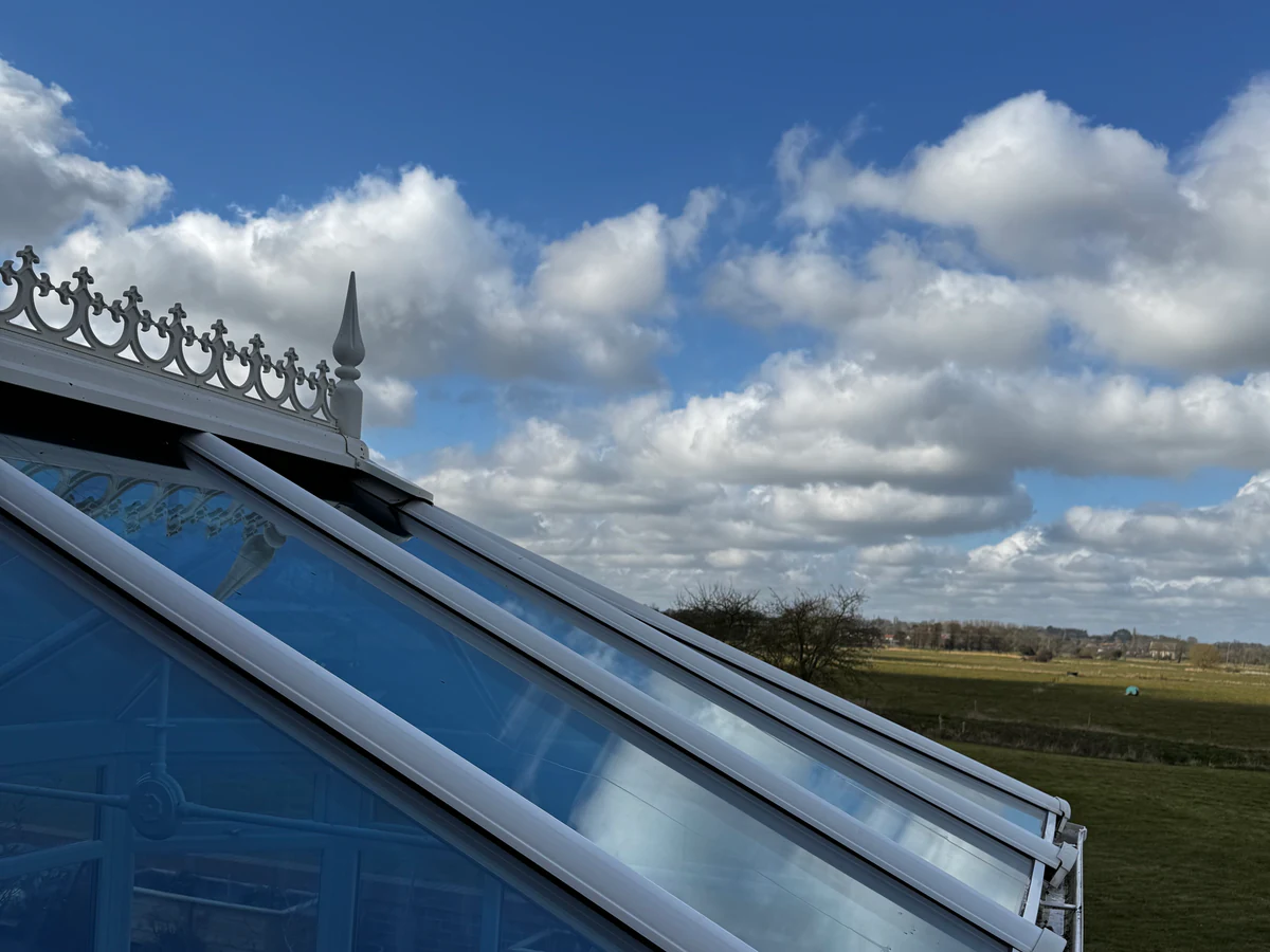 Conservatory cleaning including roof panels and gutters